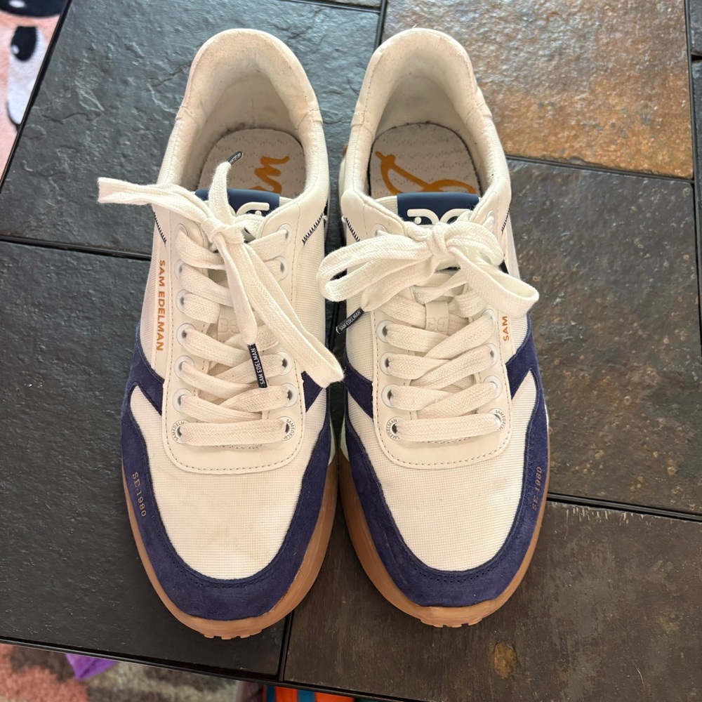 DC women’s White and Navy Sneakers